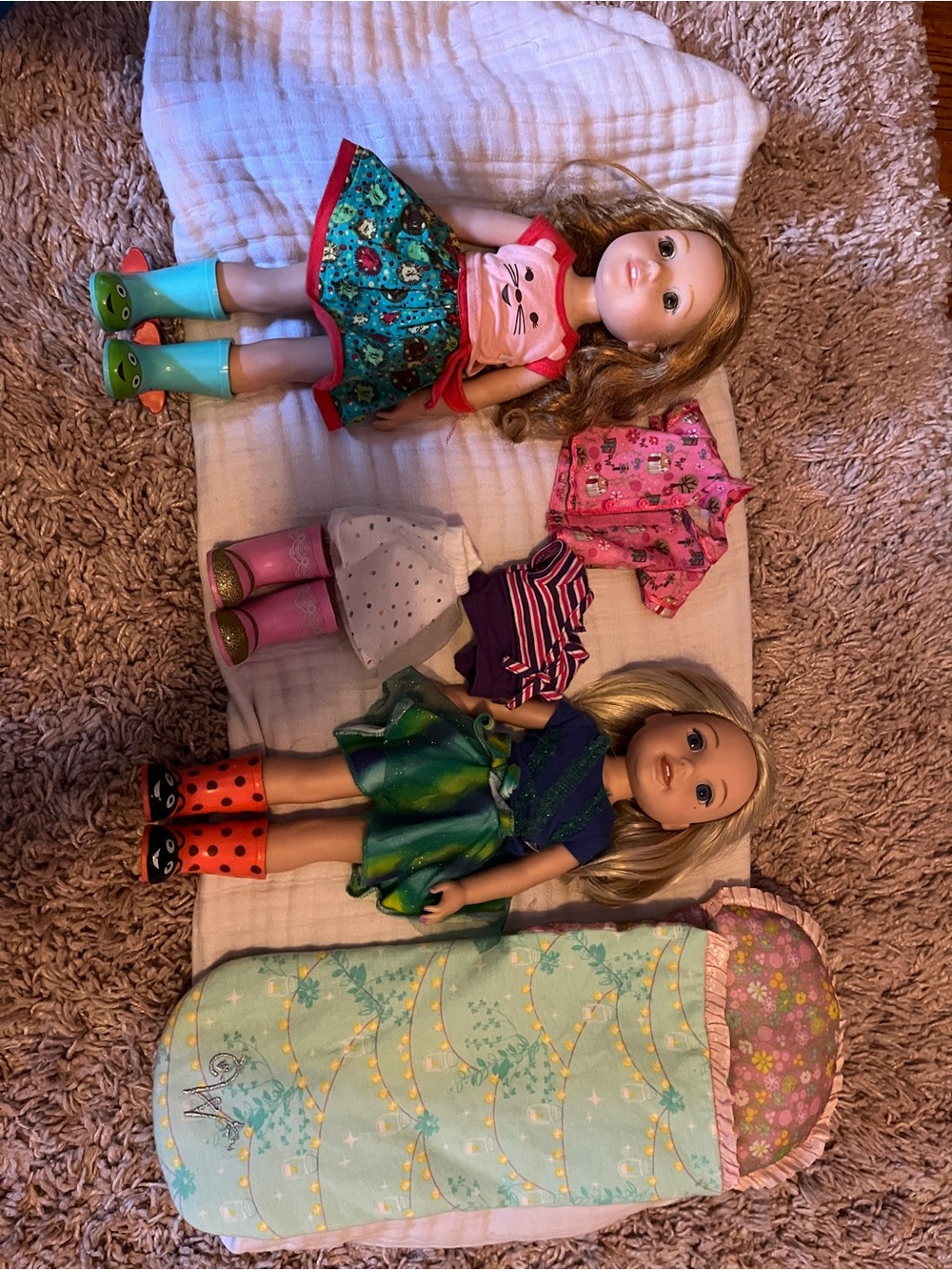 American Girl WellieWisher Dolls with outfits and a sleeping bag